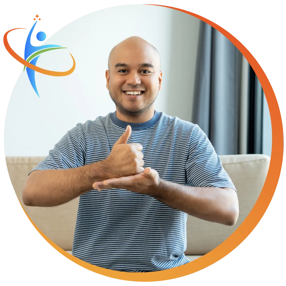 Smiling man giving thumbs up to camera