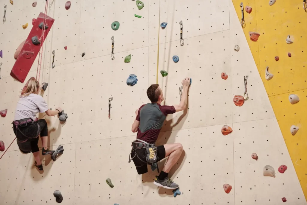 Disabled man rock climbing